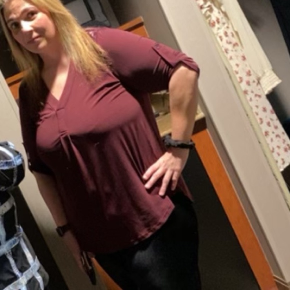 Dark purple blouse.